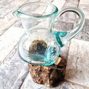 Molten Glass teapot on wood